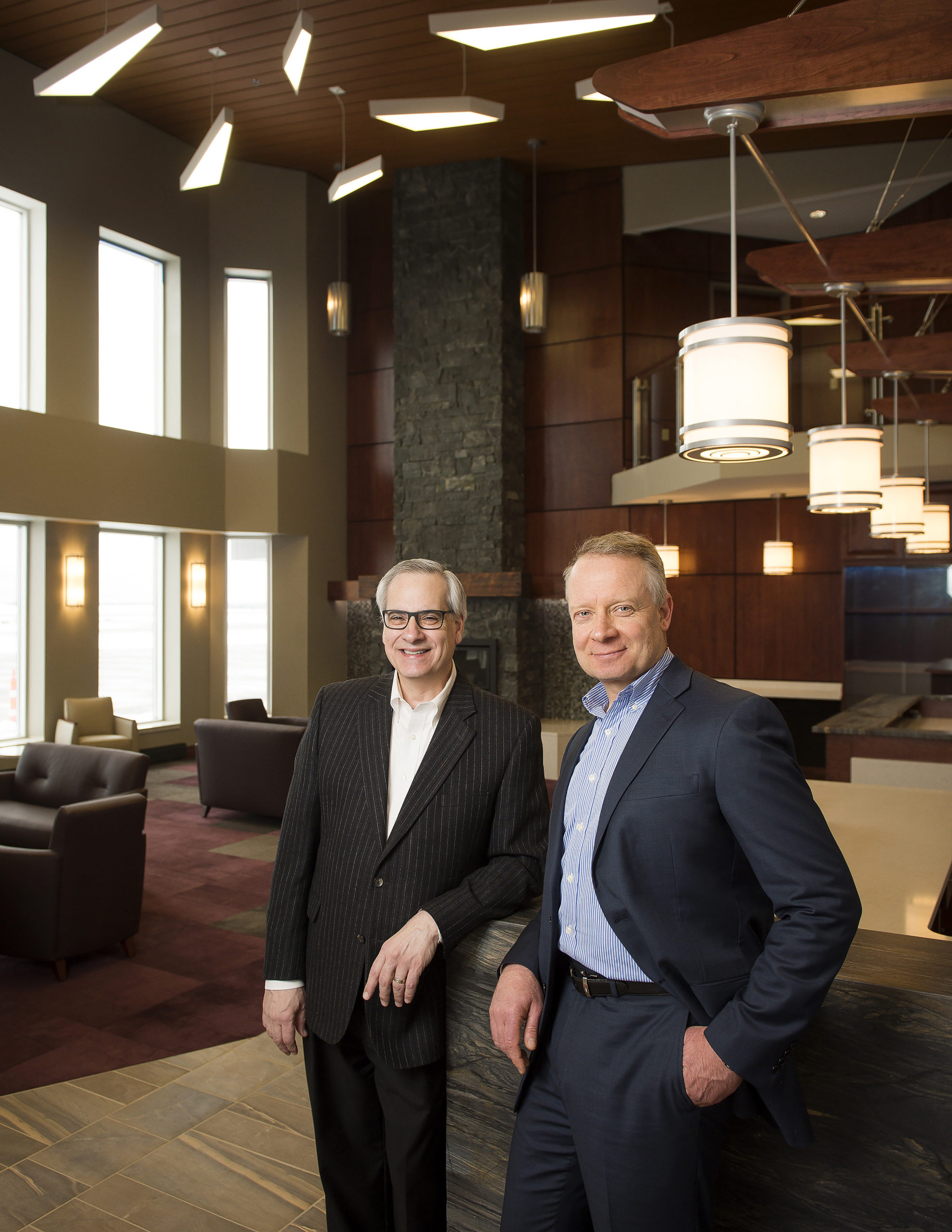 Owner Don Monaco and President Michael Magni stand in the lobby of Monaco Air